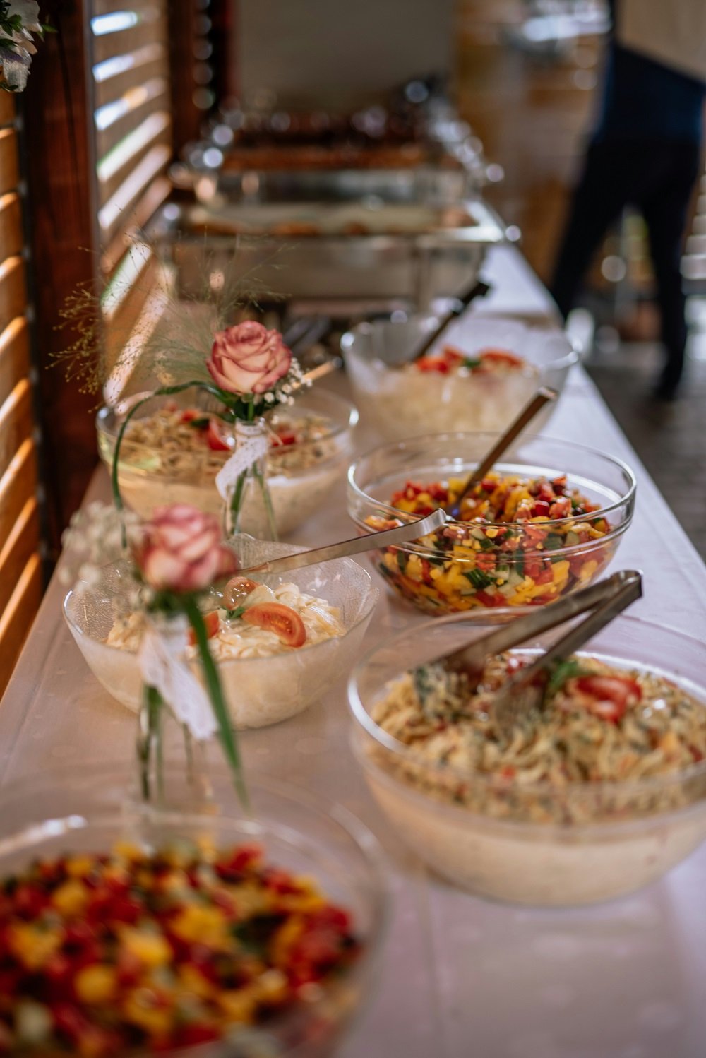 Create a delicious and memorable wedding reception with our 80 affordable wedding buffet food ideas. From savoury starters to sweet desserts, these selections will satisfy your guests without breaking the bank. Explore creative options like DIY taco bars, pasta stations, and mini dessert platters that offer variety and flavour. Click now to craft a buffet menu that delights your guests and keeps your budget in check! Here is a list of affordable wedding reception food ideas on a budget! If you're looking for wedding reception buffet menu ideas on a budget, you've come to the right place.
