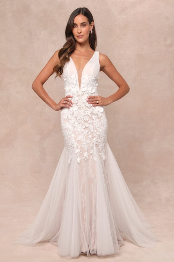 Find stunning wedding dresses from Lulus that blend elegance with affordability! Perfect for brides on a budget, these gowns feature exquisite designs, from romantic lace to sleek satin, ensuring you look and feel your best on your big day. Embrace timeless beauty with dresses that cater to every style and silhouette, all while keeping your wallet happy. Say "yes" to an unforgettable look without the splurge. Check out our curated list and find the dress of your dreams today! They are some of the best lulus wedding dresses.