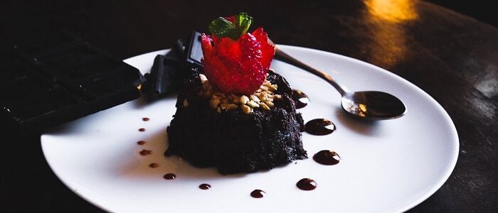 Black wedding cakes for unconventional couples. Learn more about black wedding cake ideas and how you can create something unique for your big day.
