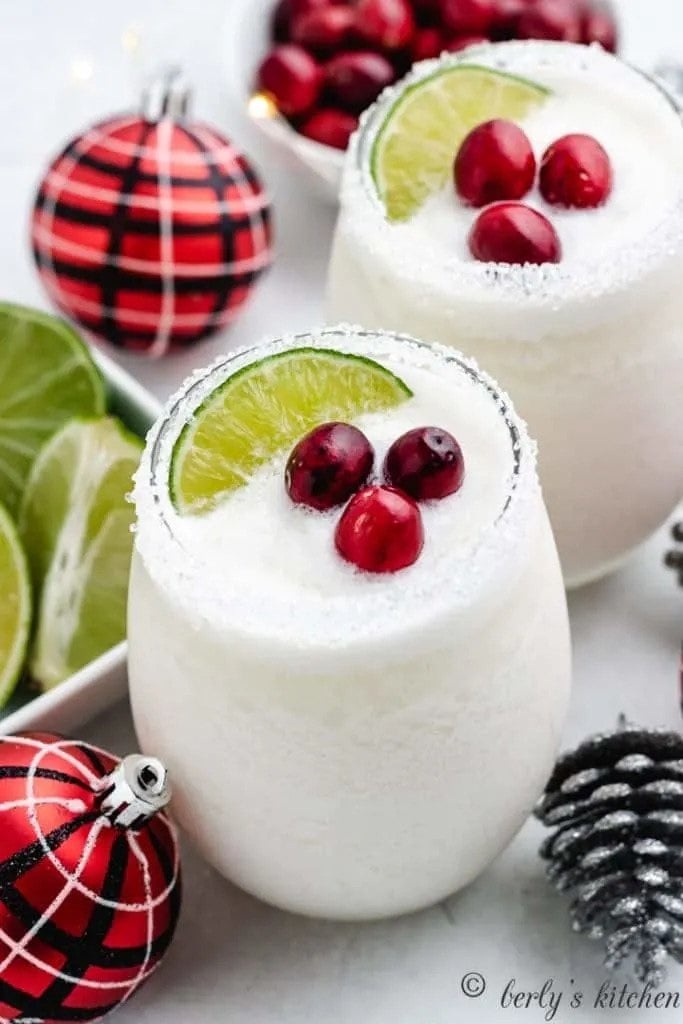 Check out this White Christmas Margarita. It's an amazing winter wedding cocktail. Having your own customized winter wedding signature drinks will have your guests refilling their glasses all night long!