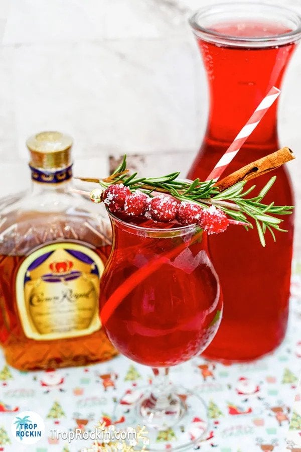 A festive, flavorful and cranberry Christmas cocktail with a touch of cinnamon that is perfect for the holiday season. Great winter wedding signature drinks for weddings.