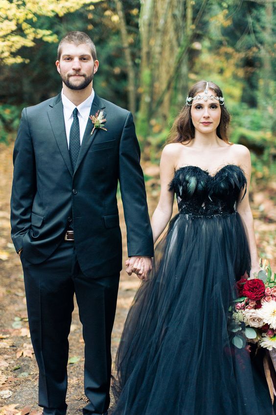 If you love Halloween, what better way to spend the holiday than by getting married and hosting the most memorable costume party of your life? We're talking spooky decor, bold-and-beautiful black wedding dresses, even full-on skeleton makeup (for the truly Halloween-obsessed).