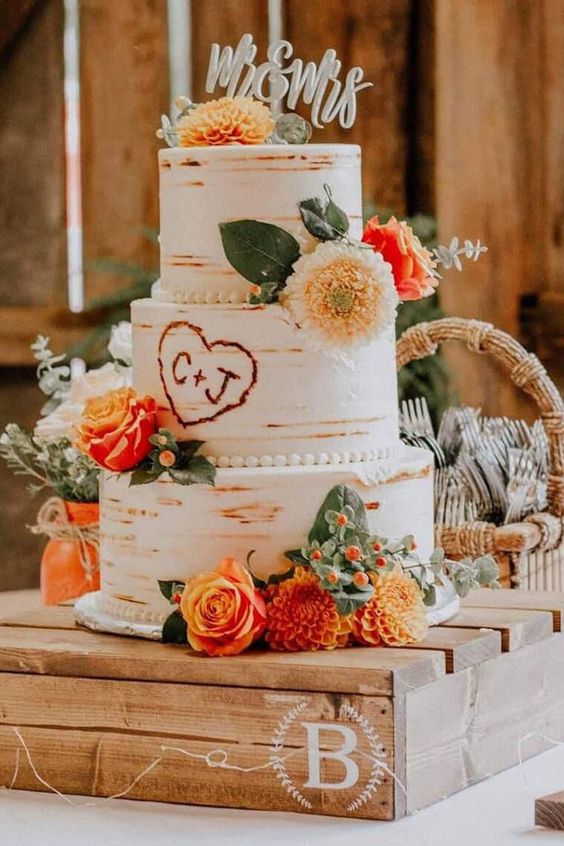 Elegant rustic wedding cake design perfect for fall weddings. If you are looking for simple rustic cakes for your fall wedding, you have come to the right place. These unique fall rustic wedding cakes are perfect for your rustic wedding theme. Rustic inspired fall wedding cake! Whether you are getting married in a barn or the country, these fall wedding cakes are perfect for those going for a rustic wedding theme!
