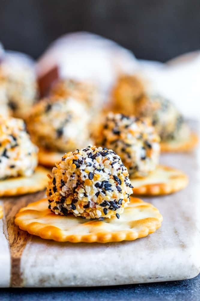 These Everything Bagel Cheese Ball Bites are the perfect bite sized appetizers for a spa-themed event. If you are looking for healthy spa food ideas, these are it! 