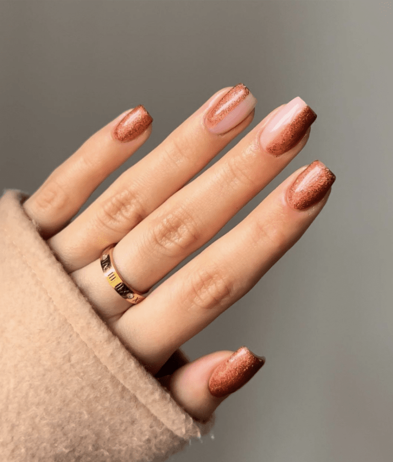 Add a little sparkle to your brown nail colour to give it a fall vibe.