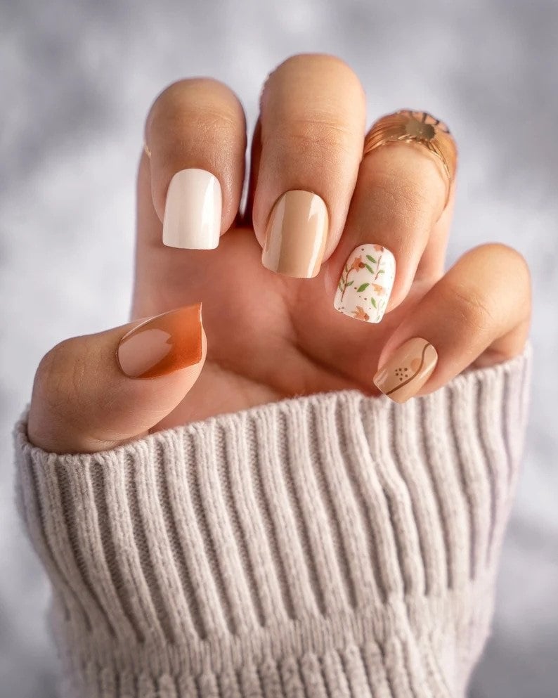 Here are 35 Fall nail designs and ideas for brides getting married this fall. They are the cutest looks and recommend all bride-to-be to try them on right now. They are nest nail colours to help inspire your wedding manicure. Floral Press on Nails For brides getting married in the fall!