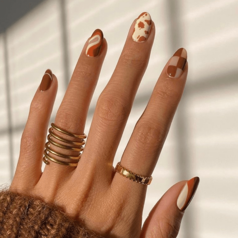 Cute Nail designs for fall weddings! A cute nail design that uses a pretty light brown color to make various brown designs.