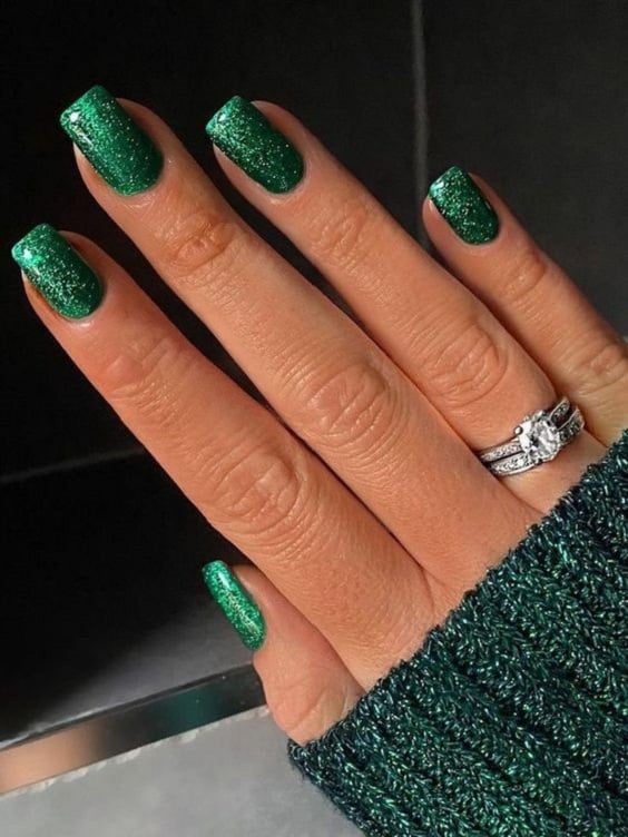 Green wedding nails for weddings. Get your wedding nails in the holiday spirit with these 45 festive Christmas nail designs. Whether you're looking for a classic red and green design or something more unique, we've got you covered. So get ready to deck your digits in style this Christmas! | cute Christmas nails, acrylic Christmas nail designs, Christmas nail art, short Christmas nails, simple Christmas nails, Christmas nails ideas, nightmare before Christmas nails, red Christmas nails, pink Christmas nails, pretty Christmas nails |