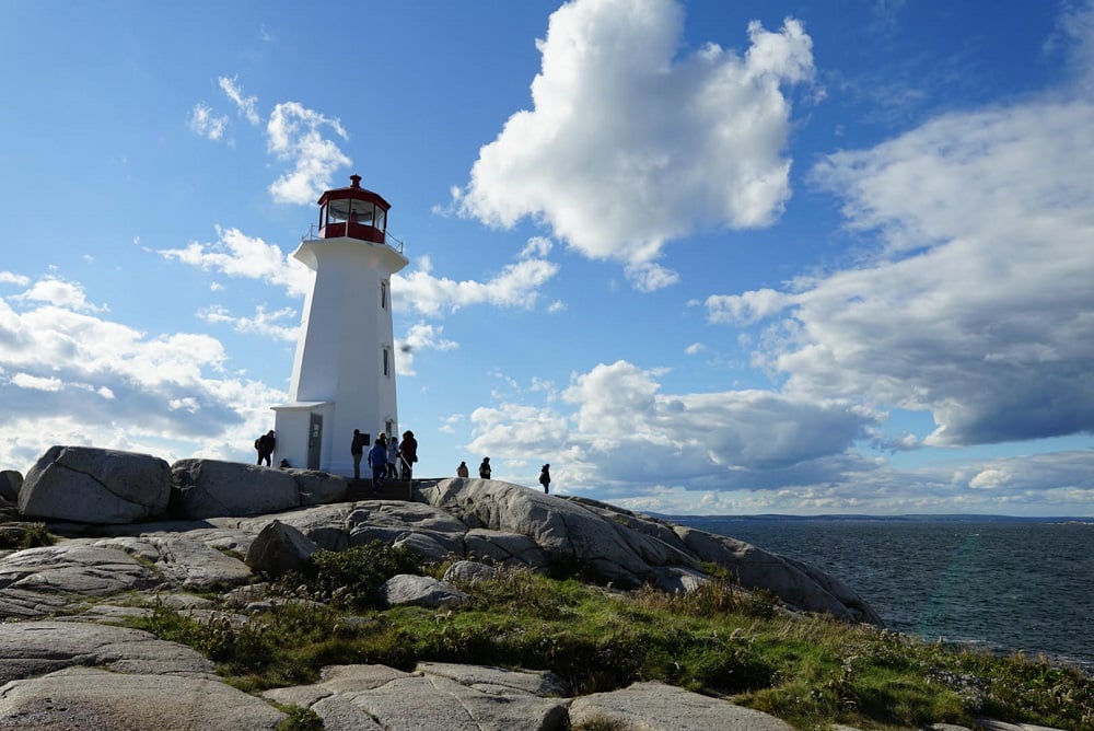 Explore the stunning beauty of Peggy's Cove and Lunenburg, Nova Scotia, on your dream honeymoon. Take in the breathtaking ocean views, stroll hand-in-hand along the historic waterfront, and indulge in delicious seafood cuisine. Peggy's Cove boasts iconic lighthouses and rocky coastlines perfect for romantic walks, while Lunenburg offers charming, colourful houses and a rich maritime heritage. Immerse yourselves in the culture and beauty of this picturesque region, and create unforgettable memories on your honeymoon. 