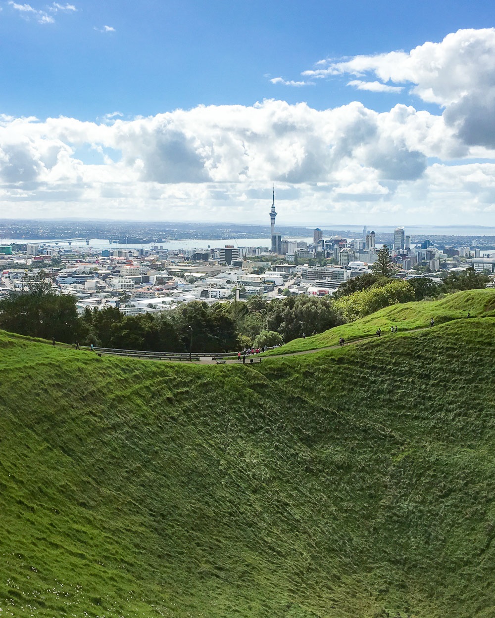 If you're looking for a unique and unforgettable experience in Auckland, New Zealand, look no further than spending the day on Mount Eden Volcano. This stunning natural wonder offers breathtaking panoramic views of the city and its surroundings, as well as a glimpse into the region's fascinating geological history. Take a leisurely hike to the summit, explore the lush greenery of the surrounding park, and soak up the sun while enjoying a picnic with friends or family. Whether you're a nature lover, an adventure seeker, or simply looking for a peaceful escape from the hustle and bustle of city life, Mount Eden Volcano is the perfect destination for a day trip you'll never forget.