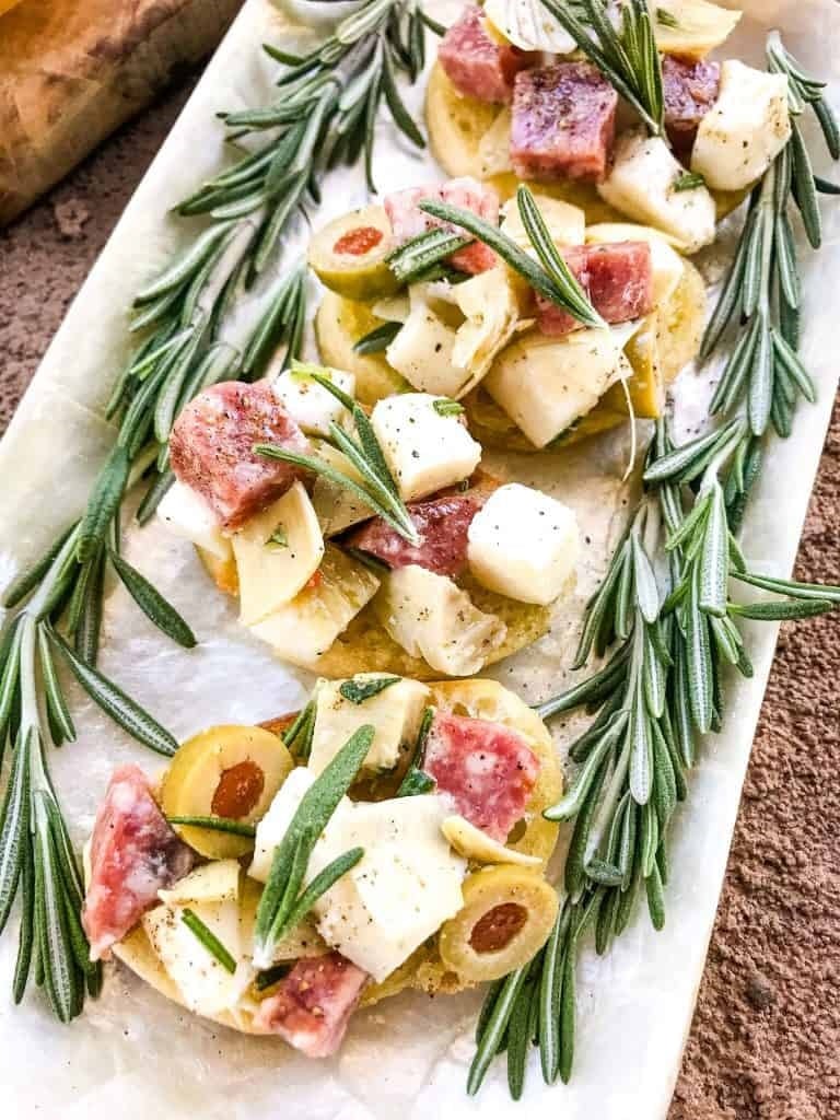 Take your bridal shower or wedding appetizer spread with these gorgeous Antipasti Crostini! Perfect for any celebration, these delightful bites combine the textures and rich flavours of Italian antipasto—think savoury cured meats, creamy cheeses, and vibrant marinated vegetables—on a crisp crostini base. A chic and delectable choice that will impress your guests and add a touch of elegance to your special day. 🌿🥖🍋 #BridalShower #WeddingAppetizers #AntipastiCrostini #PartyFood #ElegantEats