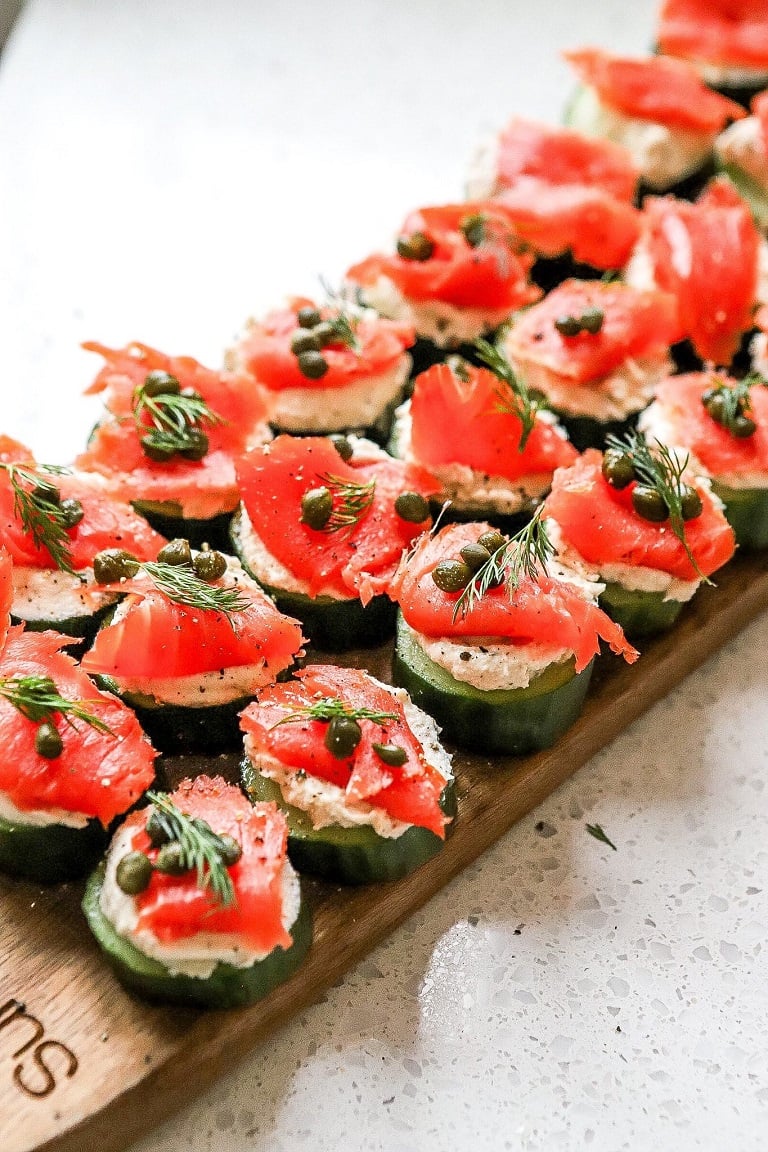 Serve your bridal shower guests with these delightful Dairy-Free Smoked Salmon Cucumber Bites! Combining savoury smoked salmon with the refreshing crunch of cucumber, these elegant bites are both delicious and guilt-free. Perfect for mingling and catering to all dietary needs, they add a chic and health-conscious touch to your special day. 🥒🐟✨