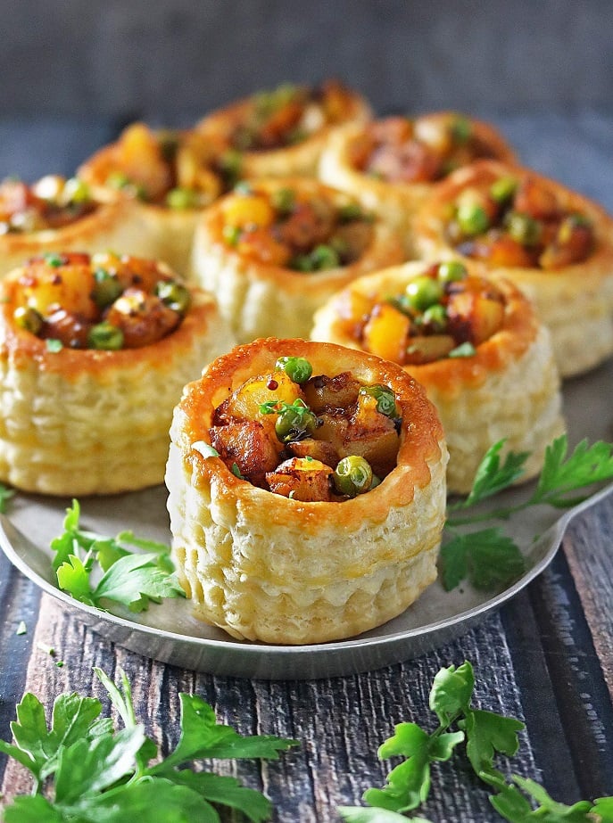 Elevate your bridal shower spread with these irresistible Spiced Potato Puff Pastry Baskets! Featuring a flaky, golden-brown pastry filled with a perfectly seasoned potato mixture, these appetizers are a delightful blend of texture and flavour. Ideal for impressing your guests, these baskets add a touch of warmth and sophistication to any celebration. 🥔🥐✨