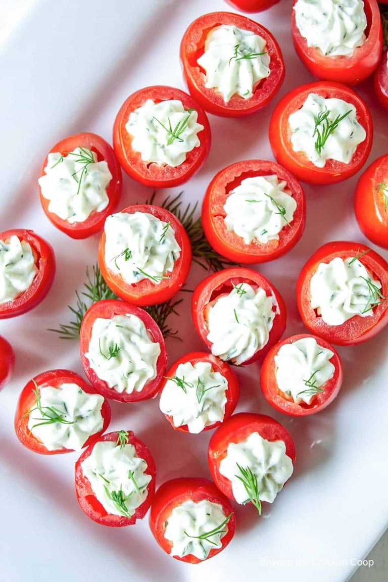 Elevate your bridal shower spread with these stunning stuffed cherry tomatoes! 🌿🍅 Packed with creamy goodness and bursting with fresh flavours, they're the perfect bite-sized treats to delight your guests. Easy to prepare and serve, these elegant appetizers will add a touch of sophistication to any wedding celebration. Ideal for mingling, they ensure your event is both chic and hassle-free. #WeddingAppetizers #BridalShower #PartyFood #ElegantEats