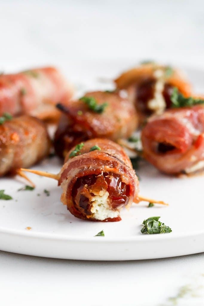Indulge your bridal shower guests with these irresistible Goat Cheese Stuffed Dates wrapped in bacon! The creamy goat cheese, sweet dates, and savoury bacon create a mouthwatering combination that’s sure to impress. Perfect for an elegant gathering, these bites add a touch of gourmet flair to your special day. 🥓🧀✨