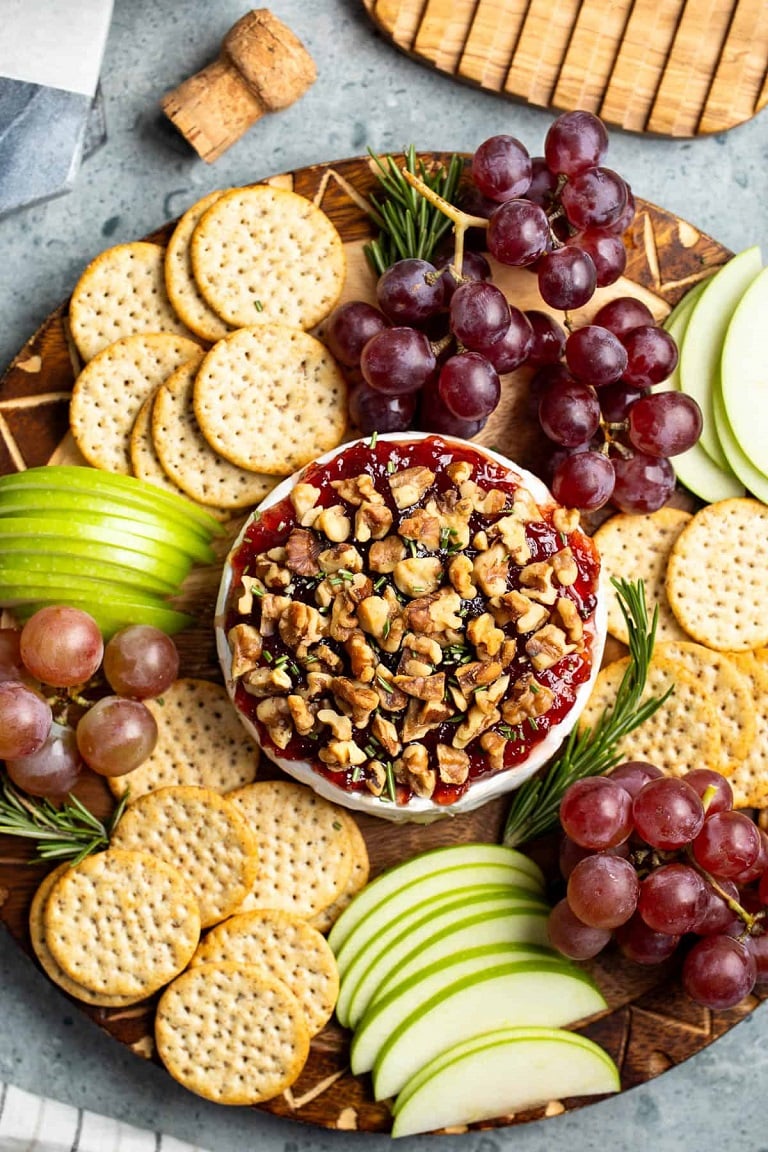 Take your bridal shower or wedding reception to the next level with our irresistible baked brie with jam appetizers! These delightful bites feature creamy Brie wrapped in golden pastry and topped with sweet, tangy jam, making for a sophisticated yet comforting treat. Perfect for adding elegance and flavour to any celebration, they’re sure to be a hit with your guests!
