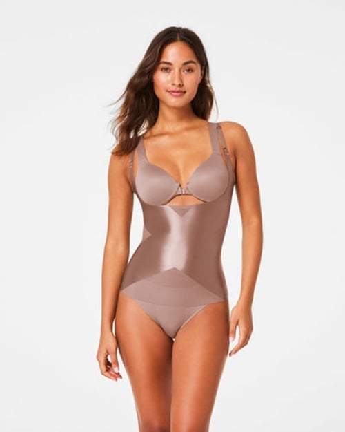 Transform your wedding day look with Spanx wedding shapewear! Designed to smooth and flatter every curve, Spanx offers a seamless fit that enhances your silhouette under any gown. Feel confident and comfortable as you walk down the aisle with shapewear that supports and shapes in all the right places. Whether you desire a little extra support or a sleek look, Spanx has you covered. Discover the perfect foundation for your dream dress and make your special day effortlessly elegant!