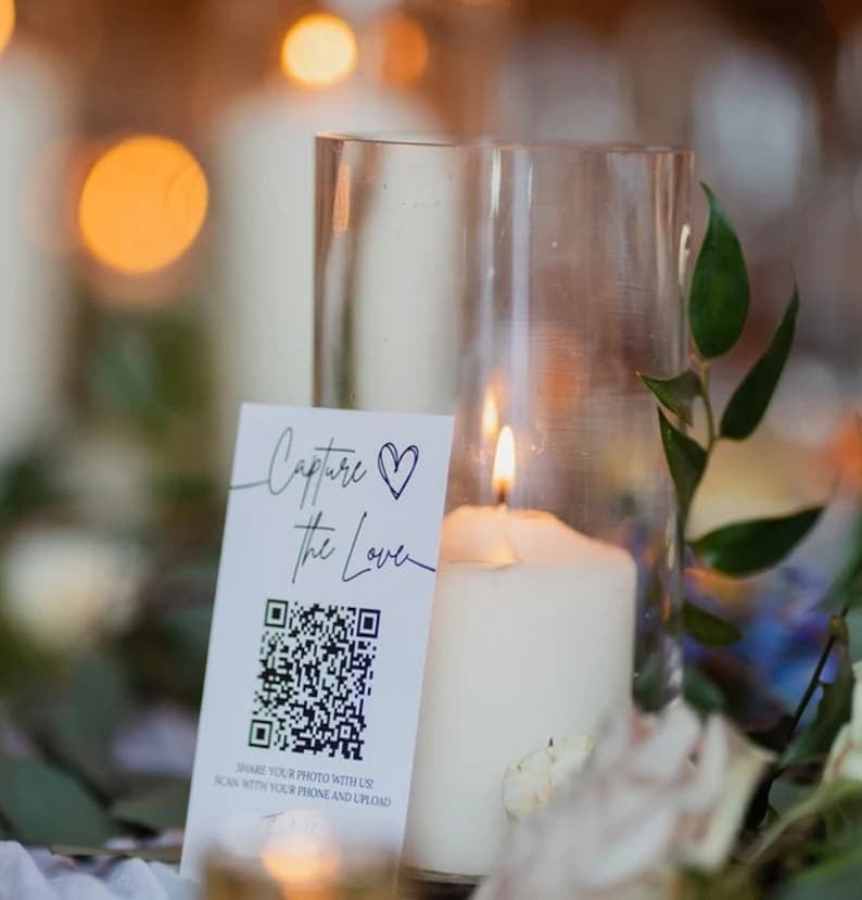 Add a modern twist to your wedding with elegant QR wedding signs! These stylish signs let guests access your digital wedding album by scanning the QR code, making photo sharing a breeze. Personalize them to match your theme, ensuring they blend seamlessly with your décor. Ideal for tech-savvy celebrations, QR wedding signs enhance guest engagement and provide a memorable, interactive experience. Streamline photo sharing and effortlessly cherish every captured moment!