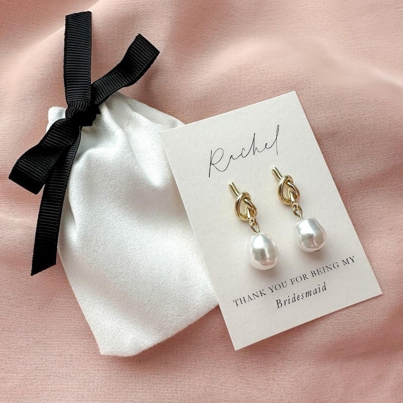 Elevate your bridal party style with the timeless elegance of Tie the Knot Bridesmaid Earrings. These exquisite pieces are more than just jewelry; they are symbols of the unbreakable bond you share with your bridesmaids and maid of honour. Their delicate design, featuring a graceful knot, represents the ties of friendship and love, making them a perfect gift. Crafted with precision, these earrings offer a sophisticated touch that complements any bridesmaid dress while adding a hint of sparkle to your wedding day. Affordable yet elegant, they ensure every bridesmaid feels cherished and special. Plus, they are versatile enough to be worn long after the wedding, serving as a beautiful reminder of your unforgettable day. Show your appreciation with these meaningful keepsakes that combine style, sentiment, and timeless charm.