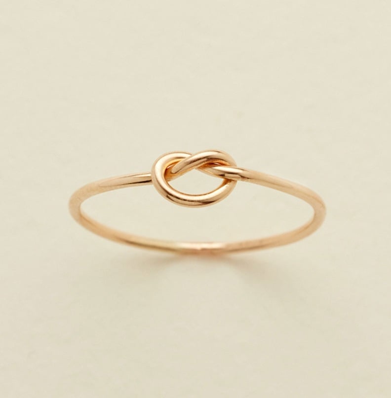 Celebrate the cherished bonds of friendship with a "Tie the Knot" ring for your bridesmaids, symbolizing the shared journey toward your special day. This elegant and meaningful piece serves as a reminder of the love and support they have provided, making it a perfect keepsake. Whether worn at the wedding or cherished as an everyday accessory, this ring beautifully intertwines style and sentimentality, making it an unforgettable gift that captures the essence of your friendship.