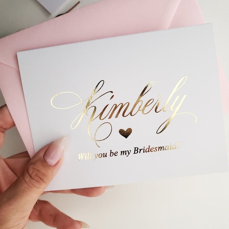 Ready to pop the question to your besties? Check out these creative ways to ask your friends to be your bridesmaids and make it a moment to remember! From personalized gift boxes filled with their favourite treats to heartfelt handwritten notes, these unique ideas will make your proposal unforgettable. Think outside the box with custom puzzles, adorable "Will You Be My Bridesmaid?" balloons, or a surprise brunch where you pop the question. Capture the moment with a Polaroid photo session or create a memory book filled with cherished moments. Your friends will love these thoughtful touches, which will make them excited to stand by your side on your big day. Get inspired and start planning the perfect bridesmaid proposal that they'll cherish forever!