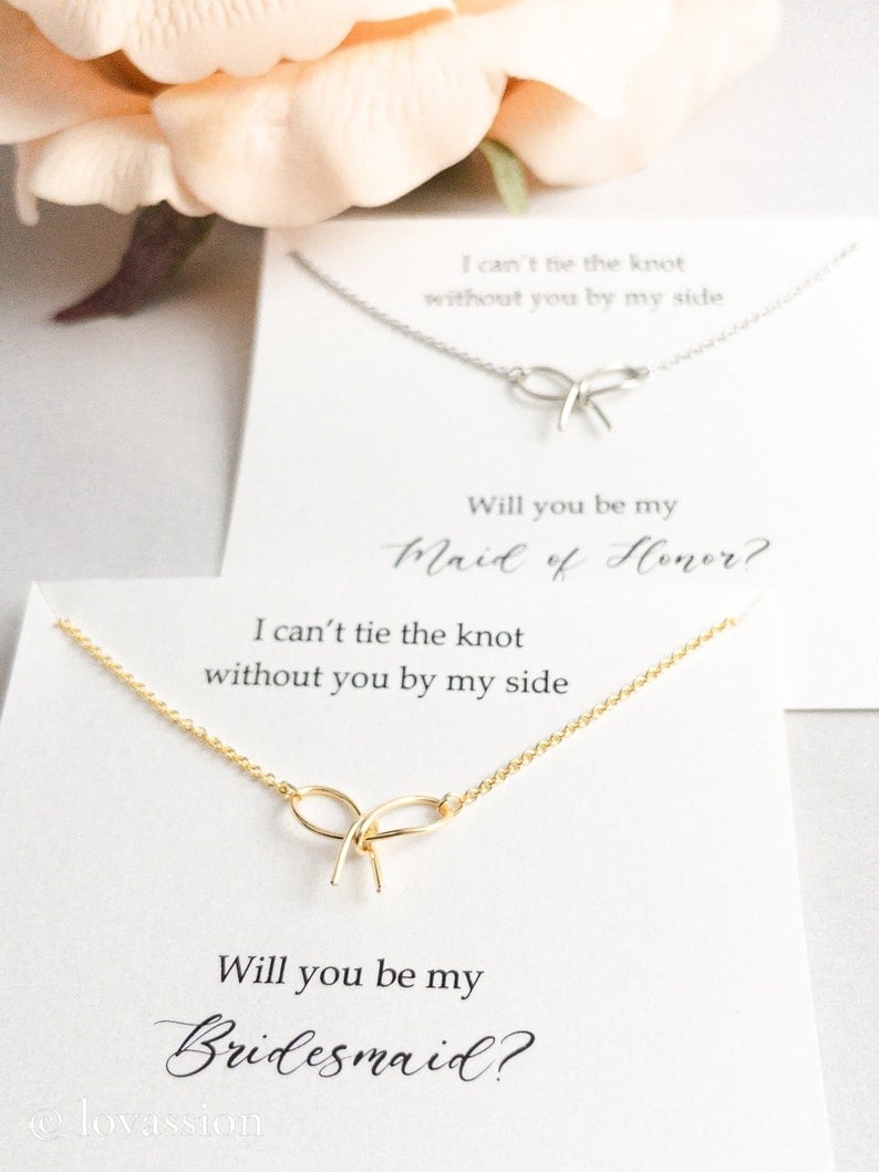 Looking for a dazzling way to ask your friends to be by your side on your big day? Discover our enchanting collection of "Will You Be My Bridesmaid" proposal jewelry! Each piece is thoughtfully designed to express your appreciation and excitement. From elegant necklaces adorned with heartfelt charms to delicate bracelets inscribed with meaningful messages, these tokens of friendship are perfect for creating unforgettable memories. Whether it's a classic pearl pendant or a chic gold bangle, our jewelry adds a touch of sparkle to your special proposal. Celebrate this cherished moment with a gift that speaks volumes and shows just how much your friends mean to you. ✨💍❤️