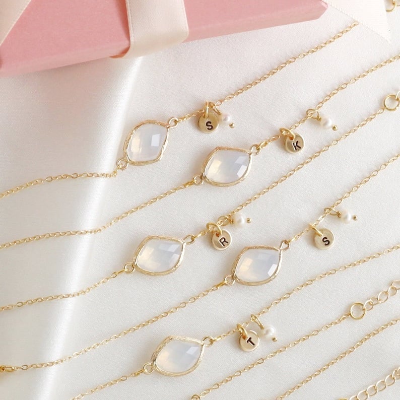 Check out the perfect blend of elegance and personalization with these stunning Personalized Birthstone Initial Bracelets—ideal gifts for your bridesmaids and maid of honour. These bracelets beautifully capture the individuality of each member of your bridal party, featuring their unique birthstones and initials in a timeless design. Not only do they serve as a stylish accessory for your wedding day, but they also become cherished keepsakes that symbolize your appreciation and the special bond you share. With their customizable features, these bracelets ensure each bridesmaid feels uniquely celebrated. Give a gift that combines thoughtfulness, style, and sentimentality, leaving a lasting impression long after your special day.