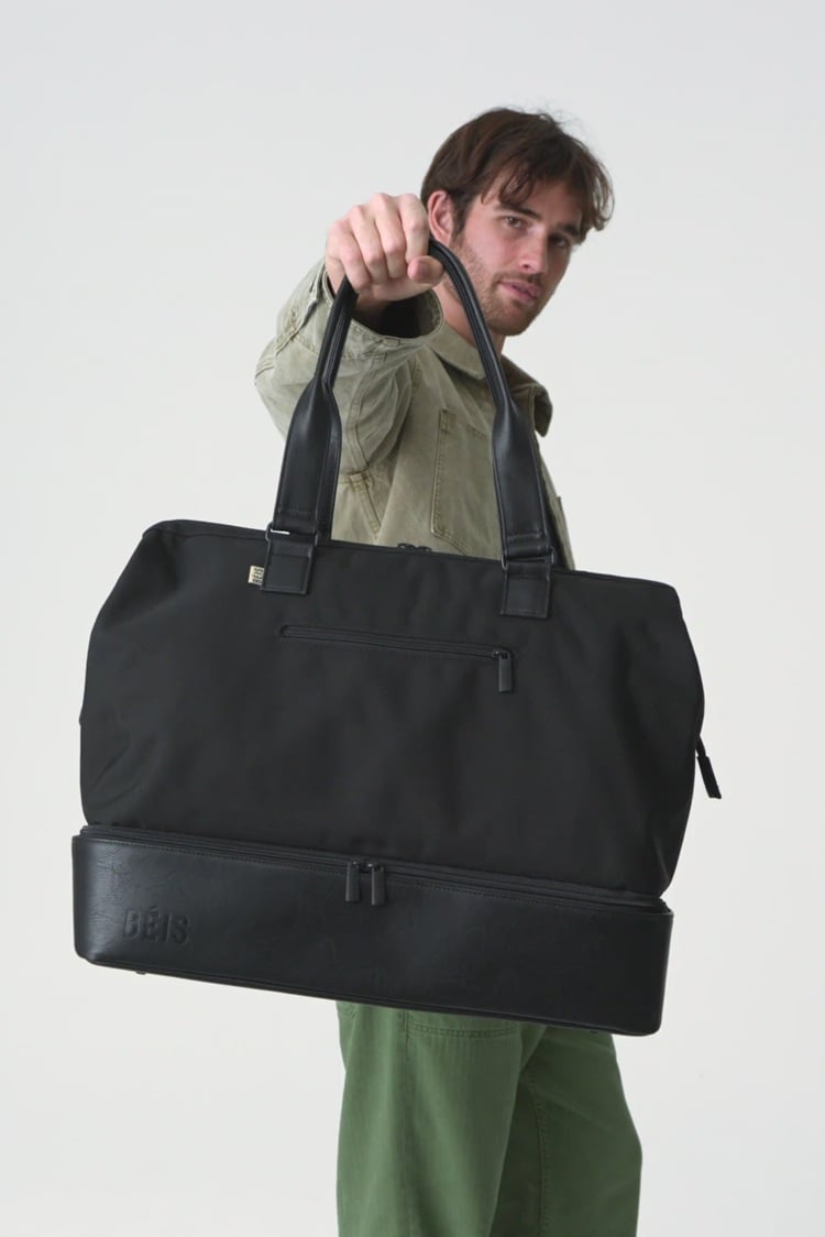 Searching for the perfect gift for the groom? We have all the best wedding day gifts for grooms. Consider a stylish weekender bag that combines elegance with practicality. Ideal for spontaneous getaways or honeymoon adventures, this versatile bag offers ample space for essentials while maintaining a sleek, refined look. Choose from classic leather or durable canvas to match his personal style. This thoughtful gift ensures he's always ready for adventure, making it a memorable keepsake for the groom's special day. Perfect for travel lovers, this weekender bag is the ultimate blend of fashion and function.