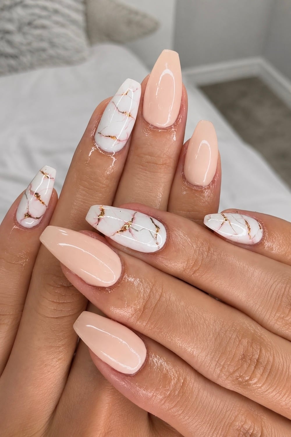 Elevate your bridal look with these stunning Nude Marble Engagement Nails, perfect for brides-to-be. Delicate swirls of marble create an elegant and timeless design, while the nude tones ensure versatility and sophistication. These chic nails are a top trend in bridal beauty, adding a subtle yet luxurious touch to your special day. I love all the "bridal nails," "elegant nail art," "nude nail designs," and "marble nail trend." Get inspired by this must-have style for your big day and make your wedding aesthetic unforgettable!