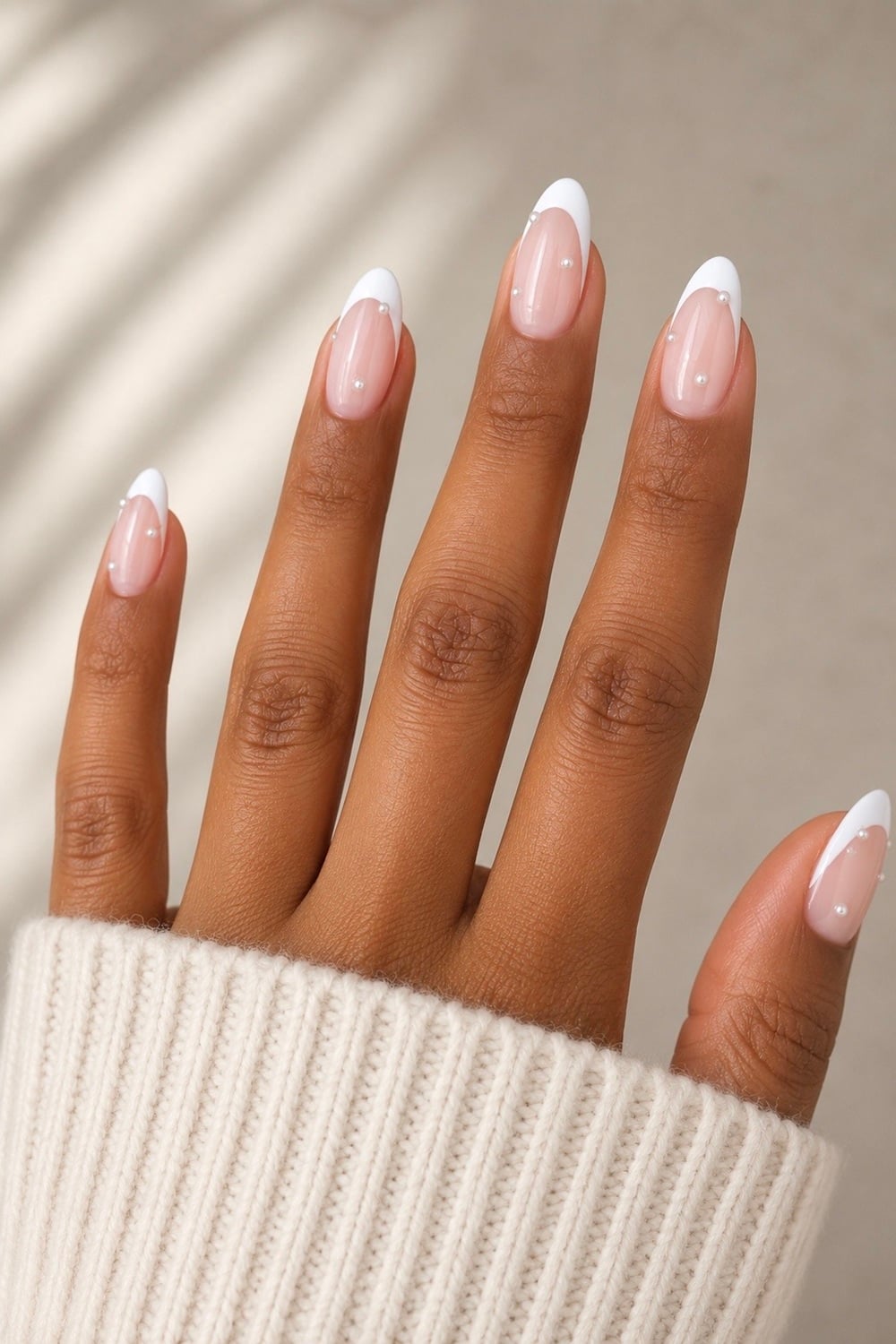 Create an elegant and timeless look with pearl accent engagement nails, perfect for your special day! Discover stunning designs that incorporate delicate pearl details, adding a touch of sophistication and luxury to your manicure. From classic French tips to modern ombre styles, these pearl accents bring a unique flair to your wedding nails. Ideal for brides-to-be seeking a chic and refined aesthetic, these nail ideas are trending on Pinterest.Pearl nails, engagement nails, bridal manicure, wedding nail art. #PearlNails #EngagementNails #BridalManicure
