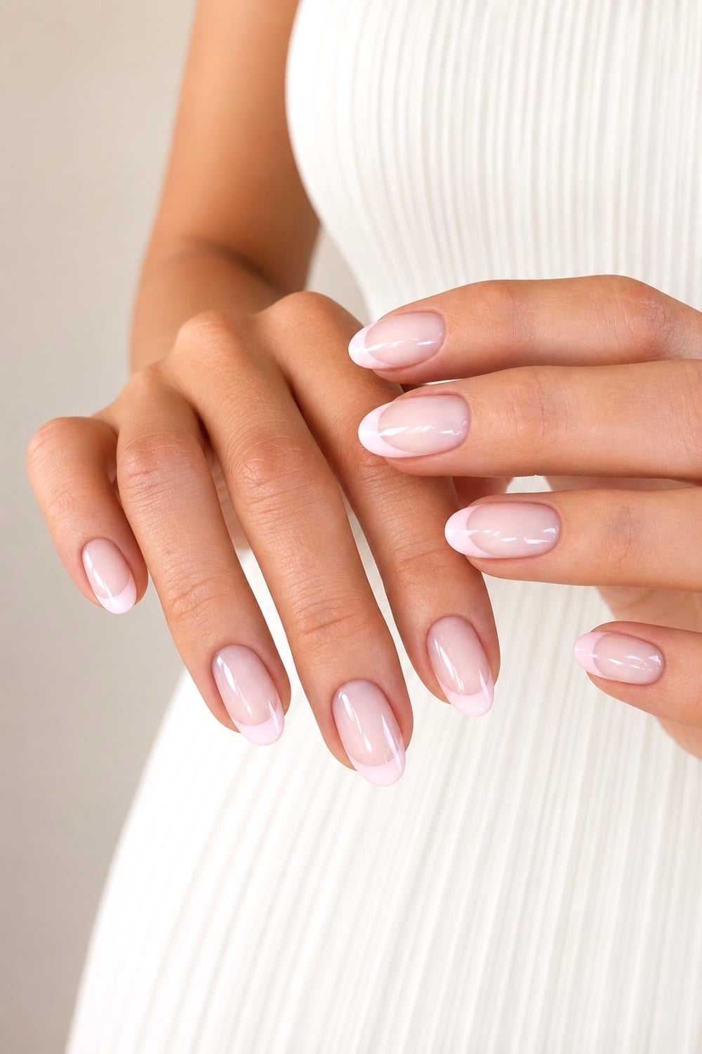 Get ready to say "I do" with these stunning soft pink engagement nail ideas! Perfect for brides-to-be, these elegant nail designs offer a touch of romance and sophistication. From delicate blush tones to shimmering rose gold accents, find inspiration to match your style. Ideal for proposals, bridal showers, or the big day itself, these nails are a must-see for any wedding-ready look. Explore trending styles like ombre, glitter tips, and minimalist pink hues. Pin now to save your favourite nail art ideas and ensure your hands are picture-perfect for that special moment! #EngagementNails #WeddingNailInspo