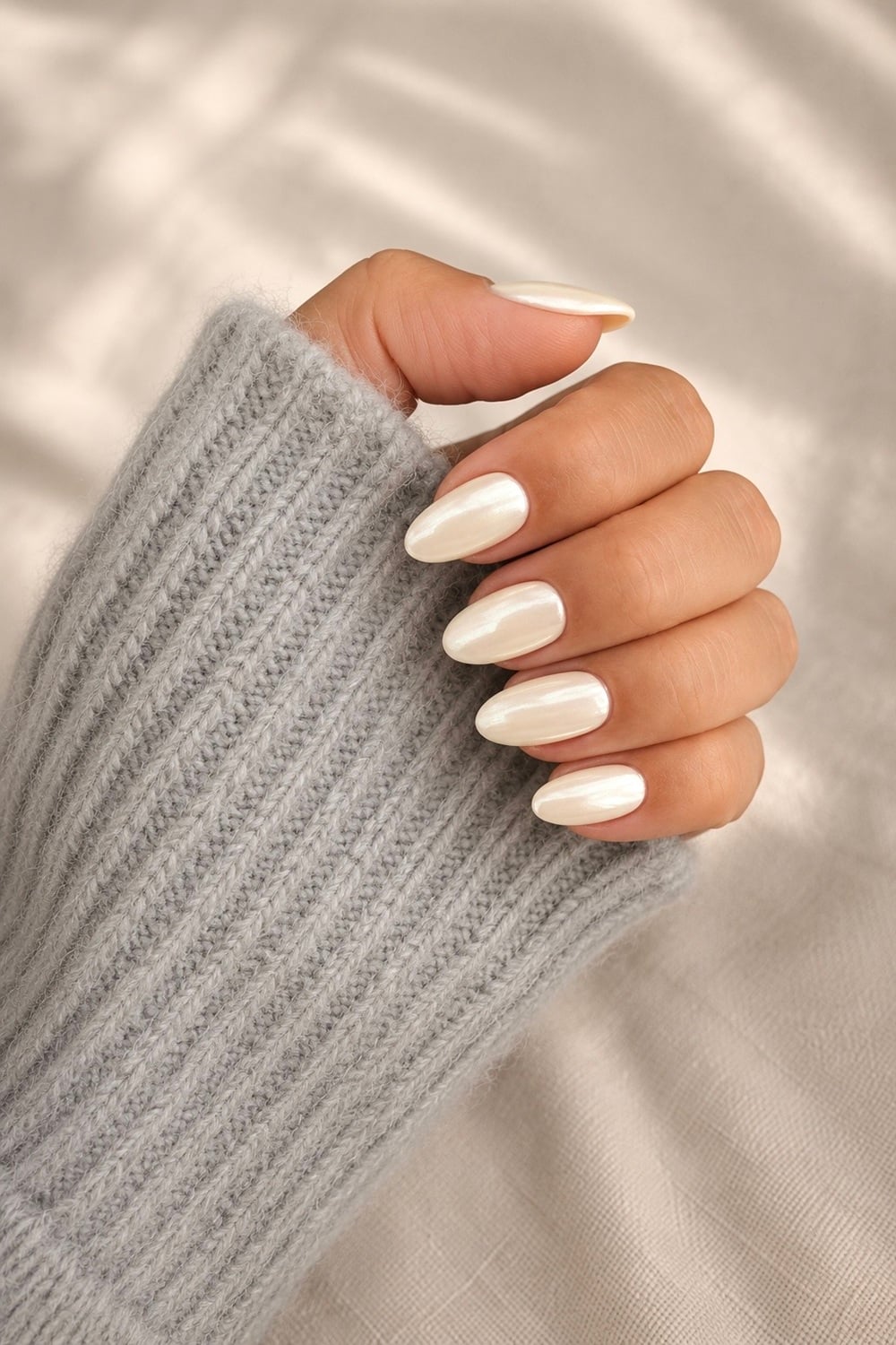 Discover the allure of vanilla chrome engagement nails, a sophisticated choice for brides-to-be. These nails feature a stunning blend of soft vanilla tones with a high-shine chrome finish, perfect for adding a touch of elegance to your wedding day look. Ideal for any bridal style, from classic to modern, these nails are sure to make your ring pop. Bridal nail trends, chrome manicure, wedding nail inspiration. Save this pin for your ultimate wedding-day nail inspiration, and let your hands shine as you say "I do."