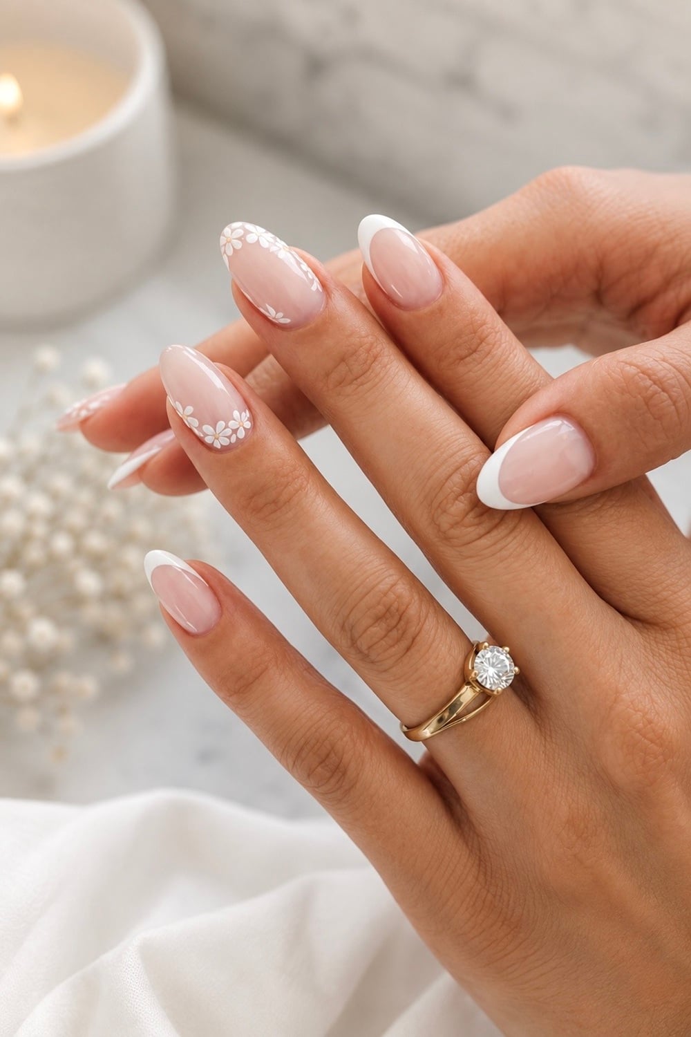 Elevate your engagement style with stunning white floral nail designs that exude elegance and romance. Perfect for brides-to-be, these manicure ideas capture the essence of love with delicate floral accents and timeless white hues. Whether you prefer dainty daisies or intricate rose patterns, these designs are ideal for a picture-perfect engagement announcement. Keywords like "bridal nails," "floral nail art," and "wedding manicure" help you find the trendiest inspirations. Discover the beauty of nature-infused nails and let your hands tell your love story. 🌸💍 #EngagementNails #BridalNails #FloralManicure