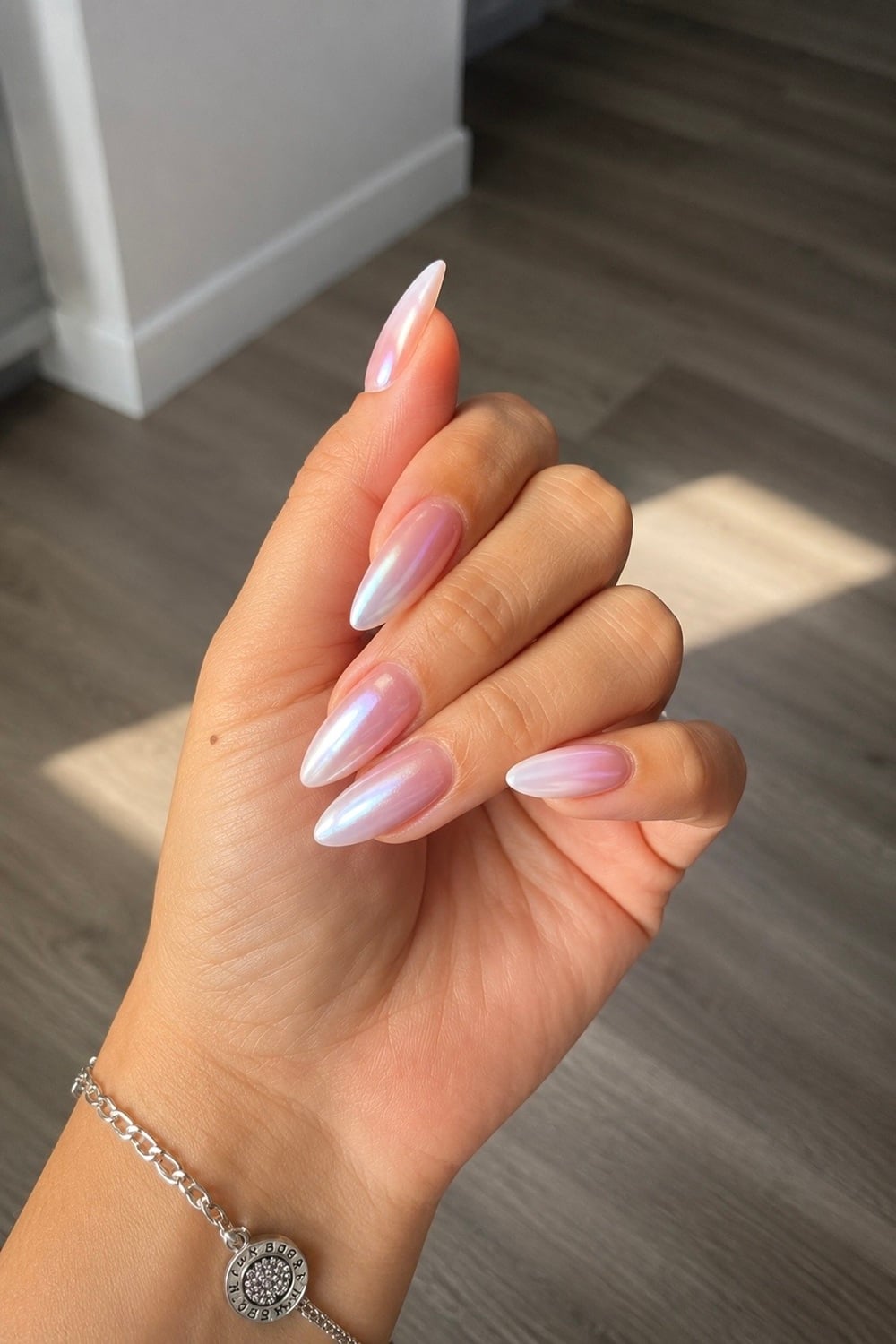 Elevate your bridal look with Pearl Chrome Ombre Nails, the perfect blend of elegance and modern style for engaged brides-to-be. These shimmering nails feature a delicate gradient, seamlessly transitioning from soft pearl to a lustrous chrome finish. Ideal for wedding day glamour, they complement any bridal ensemble. Capture attention with this trending ombre nail design, ensuring your hands are photo-ready for those cherished ring shots. Discover how to achieve this dreamy look and let your nails shine as bright as your love!
