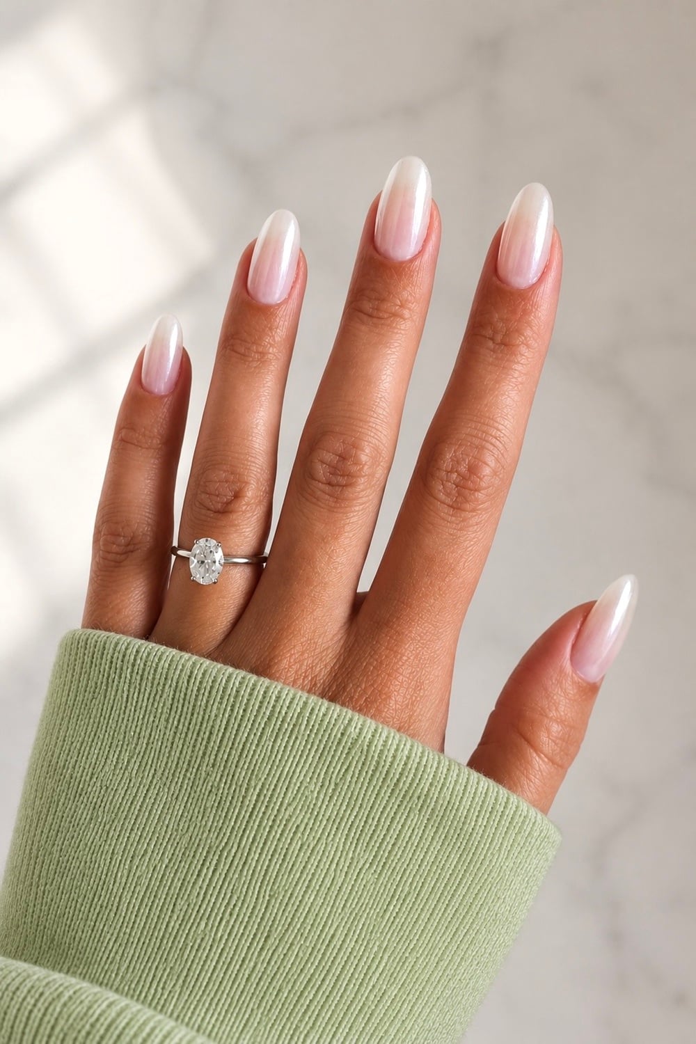 Transform your manicure with the latest trend: glazed donut nails! This eye-catching look features a glossy, iridescent finish that mimics the delectable shine of a freshly glazed donut. Perfect for any occasion, from casual outings to formal events, these nails are versatile and chic. Pair them with neutral outfits for a subtle pop or bold attire for a striking contrast. Glazed donut nail art, iridescent manicure, and shiny nail trend. Discover more inspiration on Pinterest, where creativity and style collide!